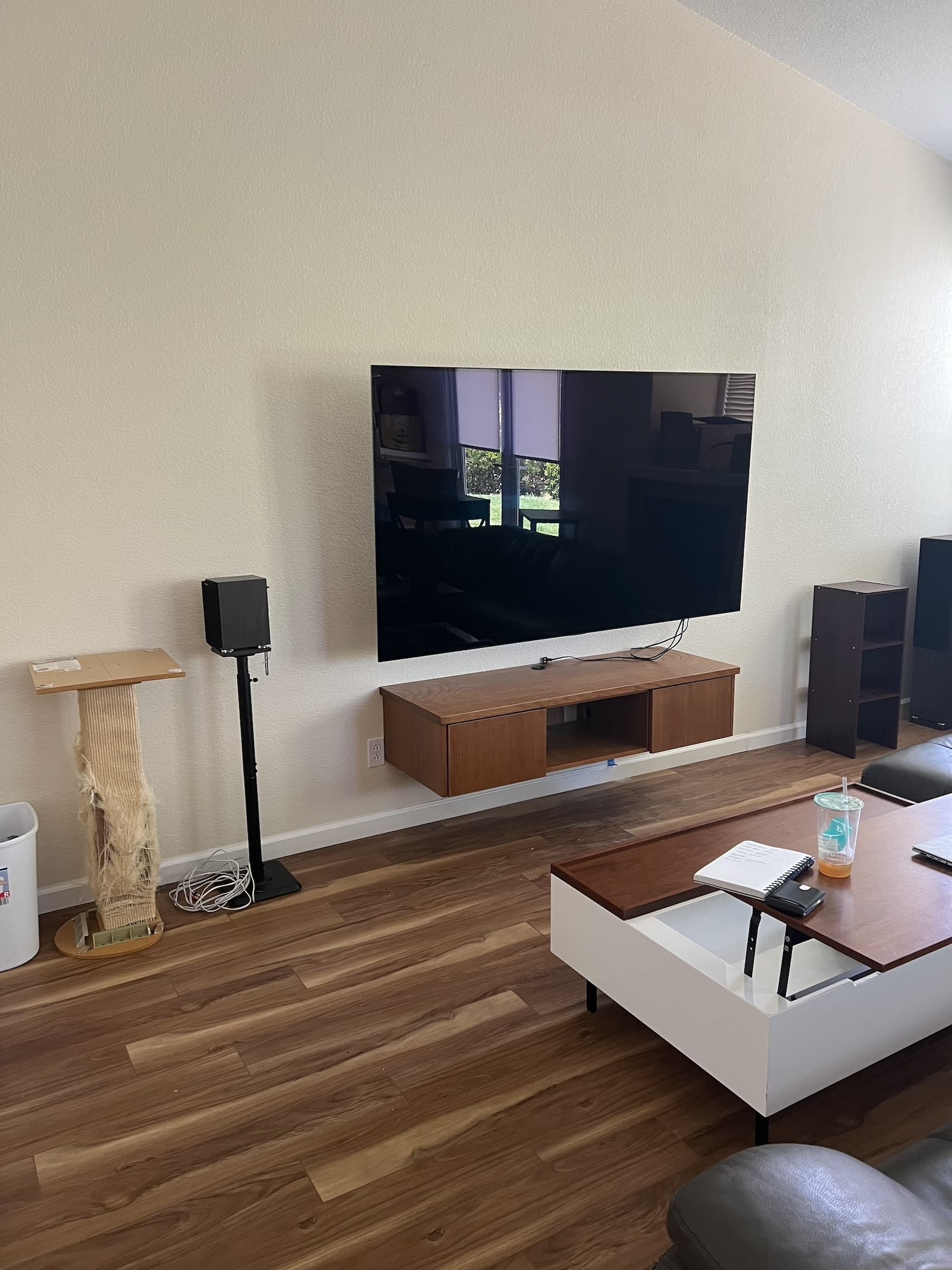 TV and entertainment stand securely wall mounted in a residential home